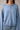 Close-up view of blue Round Rolled Hemline Detail Thin Sweater Cardigan