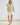 Light green collared V neck button down line lace detail shirt with white shorts