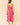 Back view of a model wearing the Two Tone Floral Button-Down Bodice Midi Dress in pink floral pattern.