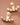 18K Gold Plated Stainless Steel White Crystal Ear Jacket Studs 7985 displayed as a pair on a brown background