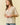 Striped Puff Sleeve Pullover Top in beige close-up view