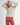 Model wearing Irisha Diamond Pointelle Sweater in Oatmeal,with hands behind head