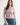 Pearl Button Ribbed Knit Cardigan in pink styled with denim jeans