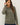 Model wearing olive green raglan sleeve slub pullover sweater