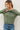 Model wearing green Ultra Soft Basic Button Up Cardigan with blue jeans