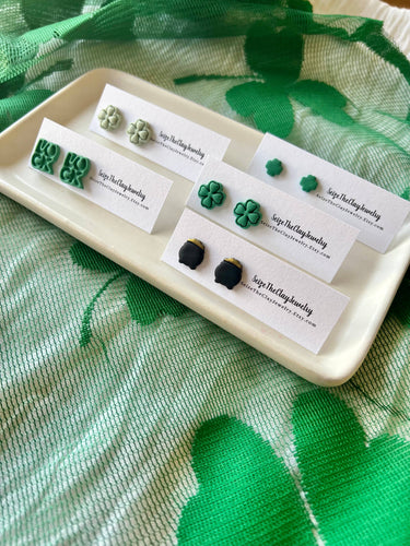 Clover Studs Shamrock Earrings Pot of Gold Studs displayed on a tray with a green backdrop.