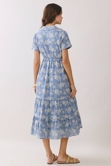 Back view of Embroidered Floral Tiered Button Down Midi Dress in blue with floral design and gathered waist.