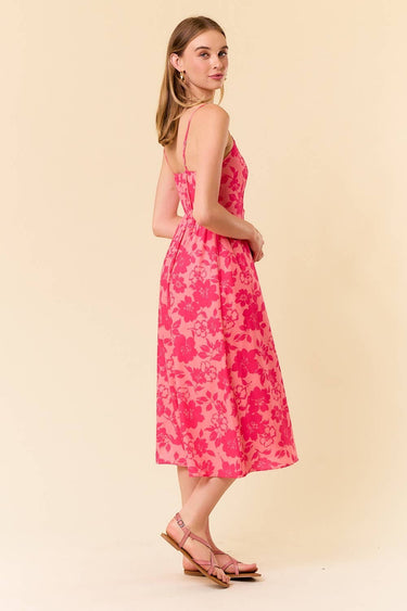 Two Tone Floral Button-Down Bodice Midi Dress showcased on a model, featuring adjustable straps and floral design.