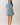 Blue Stripe Button Down Shirt Mini Dress worn by model, featuring a classic collar and cinched waist with pockets.