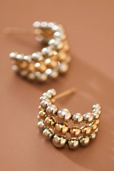 18K Gold Plated Waterproof Stainless Steel Hoop Earrings 7850 close-up showing the textured gold design