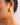 18K Gold Plated Waterproof Stainless Steel Stud Earrings 7080 worn on an ear, highlighting the sculptural design