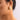 18K Gold Plated Waterproof Stainless Steel Stud Earrings 7080 worn on an ear, highlighting the sculptural design