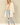 Shop Wall long sleeve open front cardigan in cream with side pockets worn by a model with distressed jeans