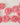 Rose Swirl Travel Soap pink rose-shaped soaps close-up
