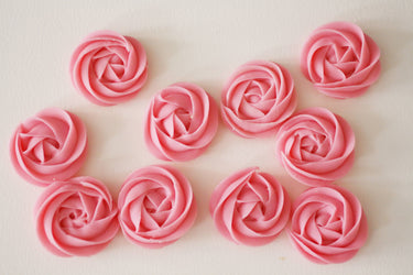 Rose Swirl Travel Soap pink rose-shaped soaps close-up