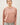 Model wearing pink long sleeve top with denim shorts