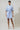Model wearing Maisie Floral Miana Button Up Mini Dress in a full-length front view