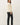 Back view of model wearing cream raglan sleeve pullover sweater