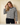 Shop Wall round neck long-sleeve sweater featuring a black and white horizontal stripe knit pattern