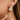 18K Gold Plated Waterproof Stainless Steel Hoop Earrings 7101 close-up of the earring on a model
