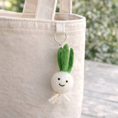 Felt Keychain - Smiley Veggies attached to a tote bag, featuring vibrant colors and a cheerful smile.