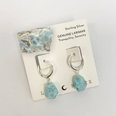 Sterling Silver Tropical Tide Huggie Hoop Earrings - Larimar featuring cool blue larimar stones on display.