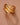 18K Gold Plated Waterproof Stainless Steel Wave Band Ring 7860 displayed on a hand against a neutral background