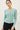 Model wearing purple [NEW COLOR] Ribbed Crewneck Cardigan in mint green.