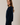 Side view of model wearing navy blue Round Rolled Hemline Detail Thin Sweater Cardigan