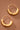18K Gold Plated Waterproof Stainless Steel Hoop Earrings 7770 close-up showing the rounded gold hoop design