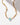 Prism Gems Birthstone Necklace - March featuring aquamarine and gold-plated starburst chain.