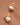 18K Gold Plated Waterproof Stainless Steel Stud Earrings 7743 displayed on a hand against a neutral background