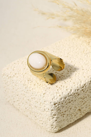 Wide wave ring with white natural stone
