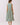 Back view of Striped Smocked Waist Round Neck Midi Dress, showcasing the smocked waist and flowing A-line skirt.