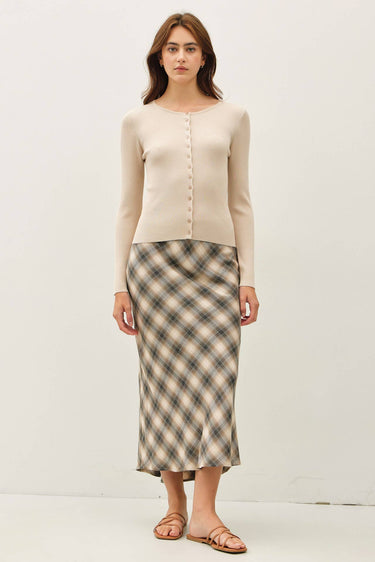 Ribbed Button Up Cardigan front view with patterned skirt