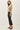 Side view of model wearing beige Ultra Soft Essential Basic Crewneck Button Up Cardigan