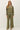 Full length view of model wearing olive green Cloud sweatfleece cropped shirt