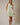 V Neck Button Up Sleeveless Print Dress front view on model in green zebra print