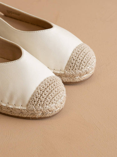 The Massa White Ballet Inspired Espadrille Flat featuring a creamy upper and crochet detail on the toe.