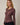 Front view of model wearing burgundy Mock Neck Long Sleeve Button Up Top