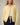 Front view of model wearing yellow Round Rolled Hemline Detail Thin Sweater Cardigan with navy shorts