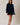 Full-length view of model wearing navy blue Round Rolled Hemline Detail Thin Sweater Cardigan