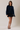 Full-length view of model wearing navy blue Round Rolled Hemline Detail Thin Sweater Cardigan
