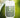 Rainwater Power Mist Hydrating Hand Sanitizer bottle with fresh green background