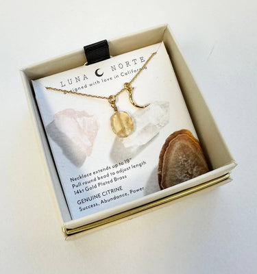 Celestial Being Necklace- Citrine displayed in a gift box with details on citrine stone and adjustable length.
