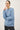 Wool Blend Ultra Soft Crewneck Classic Sweater in light blue seated view
