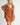 Model wearing Elianna rust wide collar cardigan with shorts