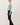 Side view of model wearing purple [NEW COLOR] Ribbed Crewneck Cardigan in mint green.
