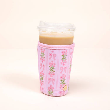 Sip Savvy Drink Sleeve Large Oh So Fancy Pink holding iced coffee in a pink floral design