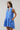 Kaidy Tropical Loly Trapeze Mini Dress featuring a ruffle trim sleeveless design in a vibrant blue pattern.